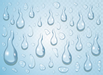 Clear transparent water drops isolated on the blue background.