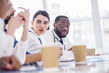 Curious therapeutics speaking during conference