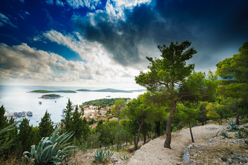 Aerial view of Hvar's harbor at claudy day. Hvar is one of the most popular tourist destination of...