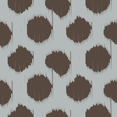 Ikat bold dots vector seamless pattern. Abstract geometric background for fabric, print or wrapping paper. Brown and gray design.