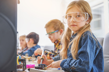 Group of interested children in workshop