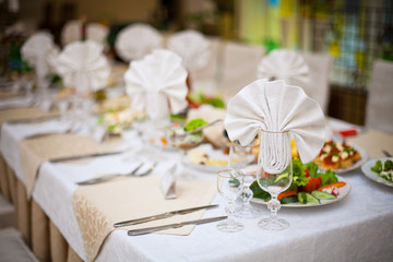 Festive table setting. Laying of a holiday table. Food background.