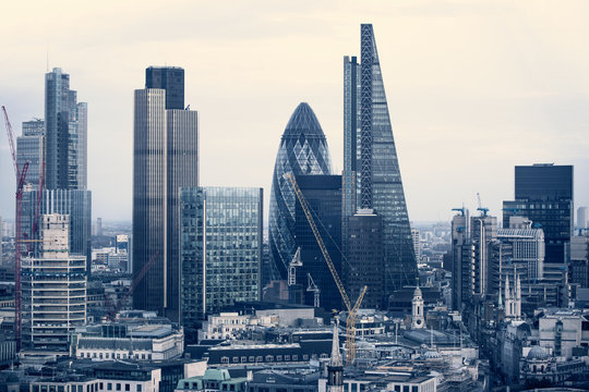 City of London business aria view at sunset. View includes Gherkin and modern skyscrapers of leading financial companies © IRStone