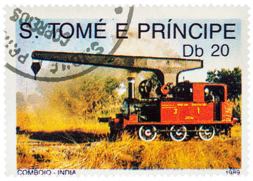 Small locomotive with lifting crane on postage stamp