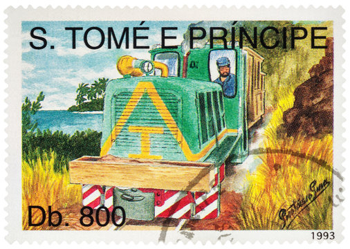 Small diesel locomotive with driver on postage stamp