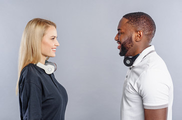 Cute young man and woman expressing their feelings