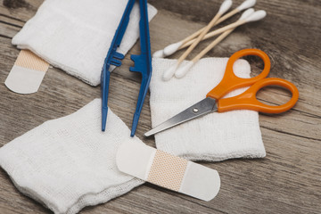 First Aid Kit on wooden table