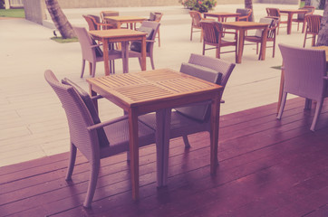 Fototapeta na wymiar Interior wood chair in cafe outdoor