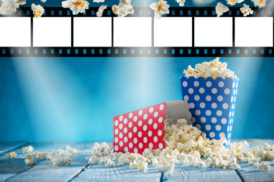 Boxes of popcorn on blue background.