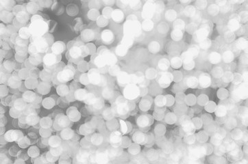 Decorative christmas background with bokeh lights and snowflakes