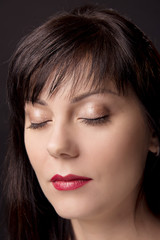 Obraz premium lose-up portrait of girl on isolated background with the demonstration of professional makeup