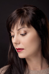Fototapeta premium lose-up portrait of girl on isolated background with the demonstration of professional makeup