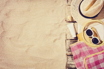 Top view of sandy beach frame. Background with copy space and visible sand texture.