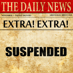 suspended, article text in newspaper