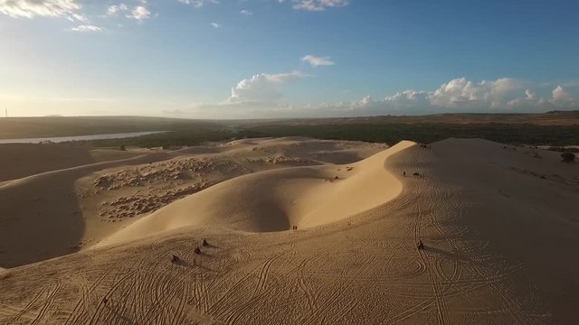 The aerial view to the sand dunes and riding ATV