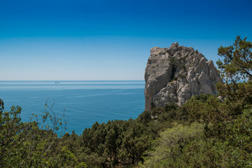 Fototapeta na wymiar Swan Wing rock on the shore of Black Sea near Simeiz, Crimea