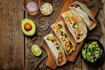 Shrimp tacos with avocado salsa