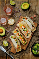 Shrimp tacos with avocado salsa