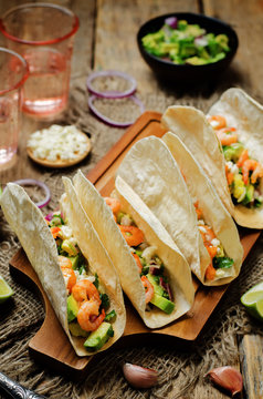 Shrimp tacos with avocado salsa