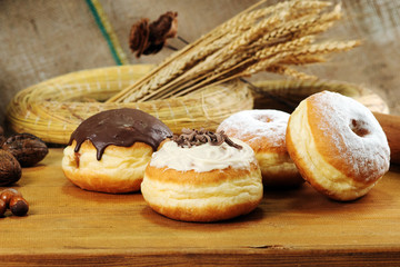Close up. Beautifully arranged delicious doughnuts with icing, s