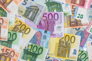 20 50 100 200 500 euros bills as background.