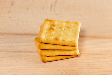 stack of cookies on wooden background