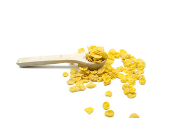 Wooden spoon with corn cereals isolated on white background