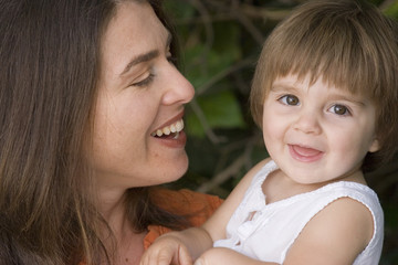 Portrait of a happy mother and her daughter.