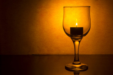 wine glass with a candle
