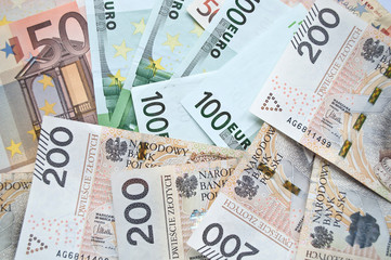 Fototapeta na wymiar Polish zloty, euro and dollar background
