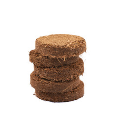 Compressed compost tablet isolated