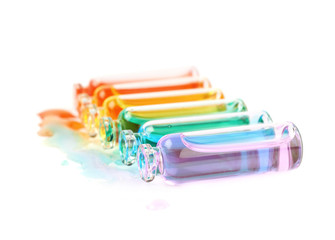 Set of tiny vial bottles isolated