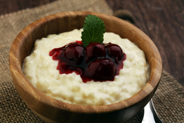 Milk rice pudding with hot cherries