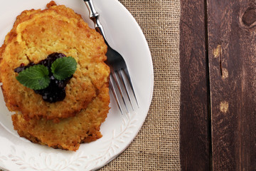 Potato pancake with cow berry sauce, selective focus