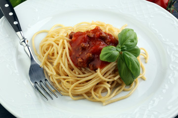 Plate of delicious spaghetti Bolognaise or Bolognese with savory