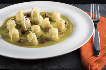 velvety green peas with dumpling, lemon and radicchio