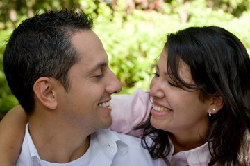 Fototapeta premium Happy hispanic couple laughing and smiling.