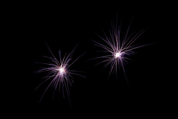 Two fireworks on black background at international competition i