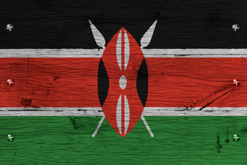 Fototapeta na wymiar Kenya national flag painted old oak wood fastened
