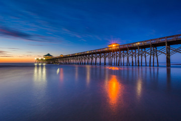 Naklejka na ściany i meble The pier at dawn, in Folly Beach, South Carolina.