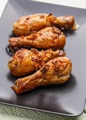 Fried chicken on black plate