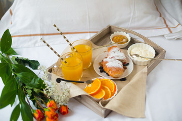 Romantic breakfast with love, croissants, coffee, orange juice