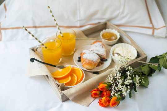 Romantic breakfast with love, croissants, coffee, orange juice