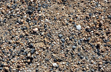 Small rocks background texture, abstract stone texture, pebbles.