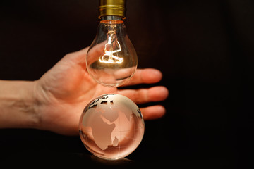Light bulb and earth