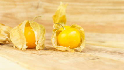 Cape gooseberry on wooden table