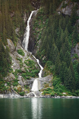 High waterfall in Alaskan fjords