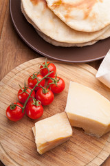 Cheese pita and tomatoes cherry

