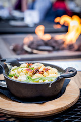 Shallow depth of field macaroni and cheese with fire