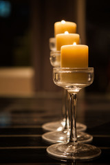 three candlestick on dining table